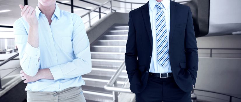 Smiling businesswoman looking at camera against empty stair way 