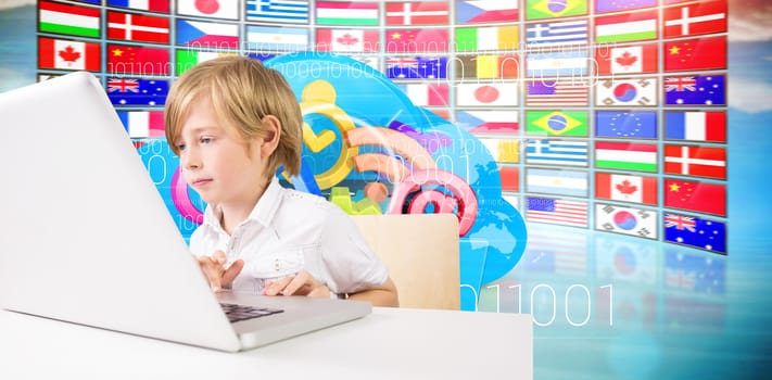 Cute boy using laptop against composite image of cloud computing drawer