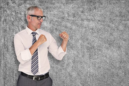 Boxing businessman against grey background