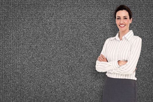 Smiling businesswoman against black background