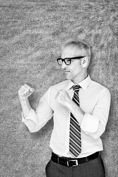 Boxing businessman against grey background