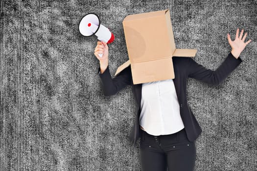 Anonymous businesswoman sending a text against grey background