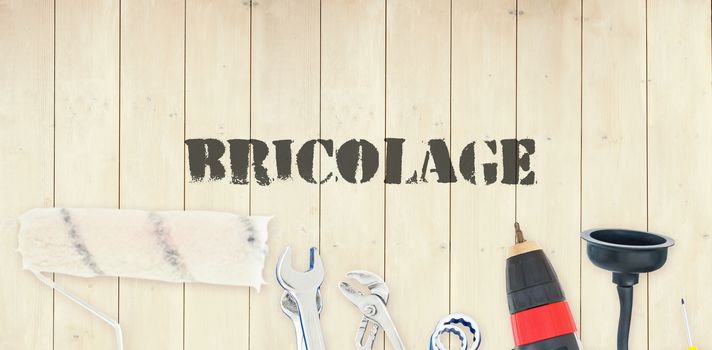 The word bricolage against diy tools on wooden background