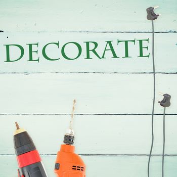 The word decorate  against tools on wooden background