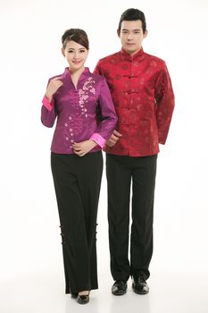 Wearing Chinese clothing waiter in front of a white background