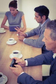 Business people in meeting with new technologies at the office 