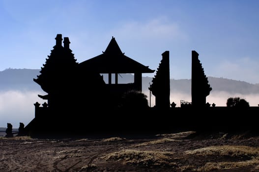 Temple silhouette at the foothills of the Bromo volcano,Tengger Semeru National Park, East Java, Indonesia