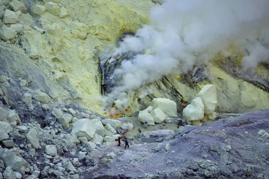 Ijen volcano in East Java in Indonesia. It's famous for sulfur mining and acid lake.