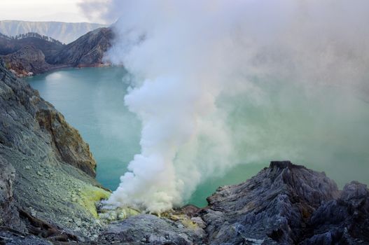 Ijen volcano in East Java in Indonesia. It's famous for sulfur mining and acid lake.