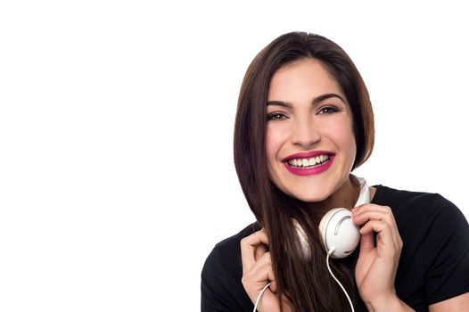 Happy young woman with in headphones