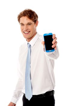 Side pose of salesman showing new launched mobile