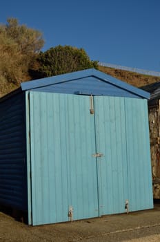 Wooden blue beach hut shed