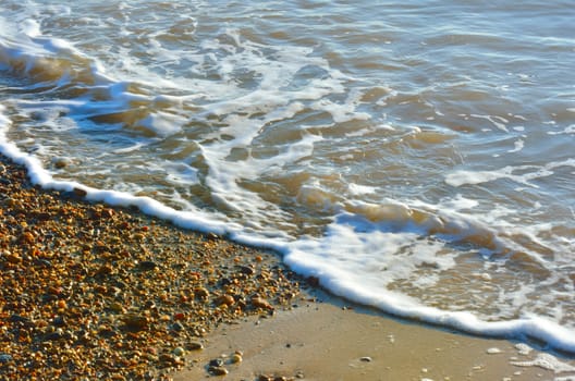 Waves and Shingle on shoreline