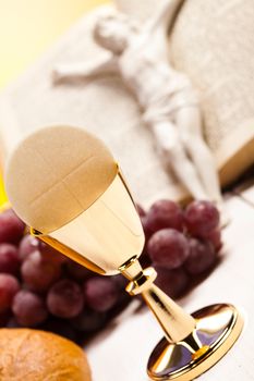 Christian holy communion, bright background, saturated concept