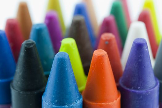 Close up of different coloured crayons