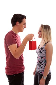 Man is giving present to his girlfriend isolated on white background