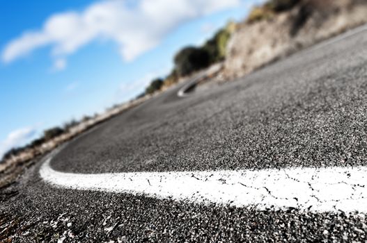 Detail curved road background.lines painted on the road