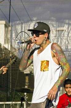 SAO PAULO, BRAZIL - MAY 17, 2015: An unidentified musician  singing rap on the street in Sao Paulo, Brazil. 