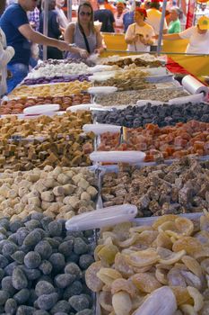 SAO PAULO, BRAZIL - MAY 17, 2015: An unidentified group of people in the hand made sweet stand at a street fair market in Sao Paulo. 