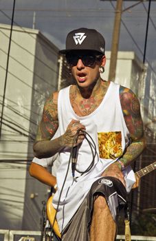 SAO PAULO, BRAZIL - MAY 17, 2015: An unidentified musician  singing rap on the street in Sao Paulo, Brazil. 