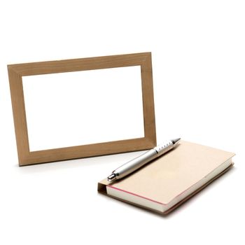 wood photo frame ams notebook with pen isolated on white background