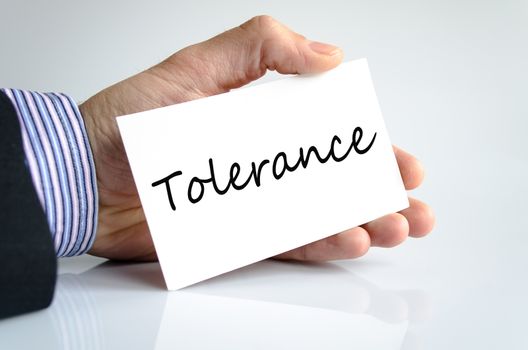 Tolerance concept note in business man hand