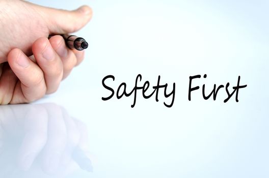 Pen in the hand isolated over white background Safety First concept