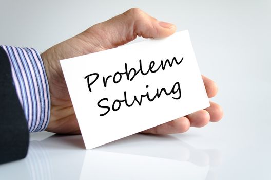 Problem solving concept note in business man hand