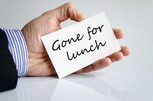 Business man hand writing Gone for lunch