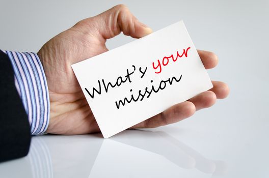 Business man hand writing What's your mission