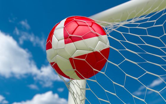 Denmark flag and soccer ball, football in goal net