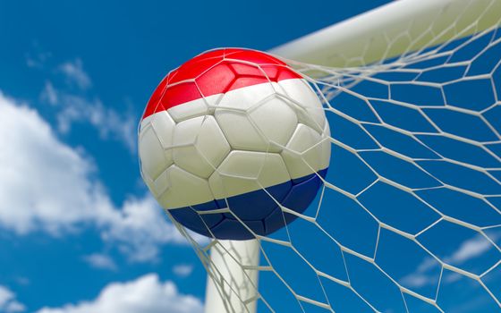 Netherlands flag and soccer ball, football in goal net