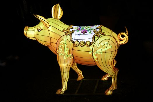 SYDNEY, AUSTRALIA - MAY 22, 2015; Vivid Sydney installation called Entitle which references both Eastern and Western culture to enhance the theme of overindulgence using the lavish Chinese lantern technique, the overly ornate Rococo-inspired design and the symbolism of the greedy pig. Artist: Amanda Parer