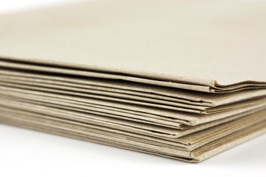Stack of folded up brown parcel paper