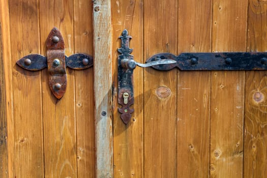 Detail background image of an old wooden door from Romania