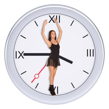 Young woman standing in center of clock on isolated white background