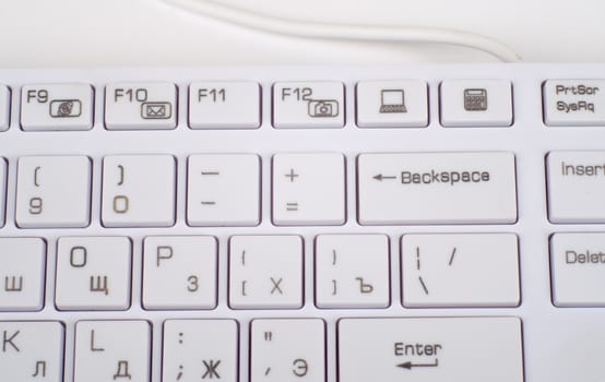 Computer keyboard on isolated white background, top view