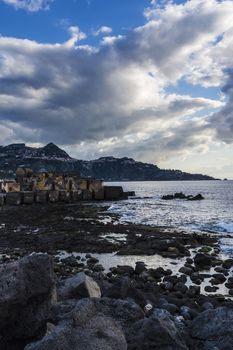 Sky with clouds before a rainstorm over the the sea at Giardini-Naxos, Sicily, Italy