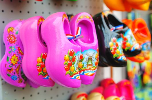 AMSTERDAM - APRIL 17: Colourful traditional Dutch wooden shoes (klomps) on April 17, 2015 in Amsterdam. Approximately 3 million pairs of klompen are made each year and sold throughout the Netherlands.