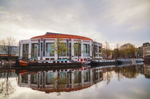AMSTERDAM - APRIL 17: Nationale opera and ballet building (Stopera) on April 17, 2015 in Amsterdam, Netherlands. The Stopera is located in the center of Amsterdam.