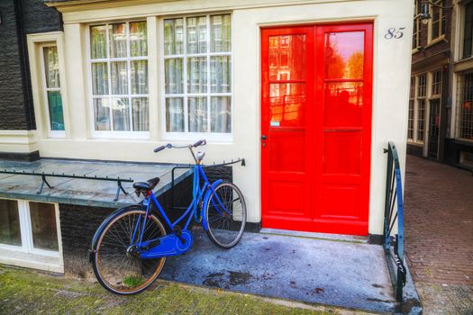 Bicycle parked near a house in Amsterdam, Netherlands