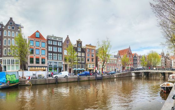 AMSTERDAM - APRIL 17: Overview of Amsterdam in the evening on April 17, 2015 in Amsterdam, Netherlands. It's the capital city and most populous city of the Kingdom of the Netherlands.