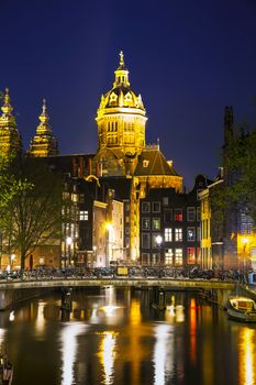 The Basilica of Saint Nicholas (Sint-Nicolaasbasiliek) in Amsterdam at sunset