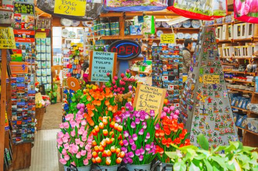 AMSTERDAM - APRIL 17: Souvenir shop at the floating flower market on April 17, 2015 in Amsterdam, Netherlands. It’s usually billed as the “world’s only floating flower market”.