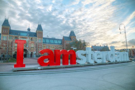 AMSTERDAM - APRIL 16: I Amsterdam slogan on April 16, 2015 in Amsterdam, Netherlands. Located at the back of the Rijksmuseum on Museumplein, the slogan quickly became a city icon.