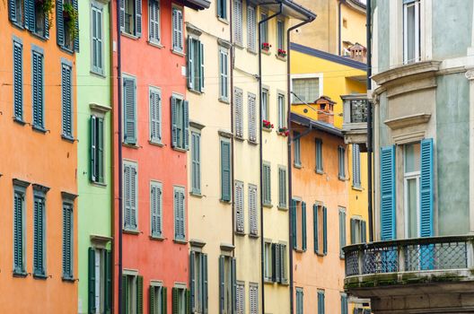 Italian houses with colorful walls and windows in Bergamo, Lombardia, Italy