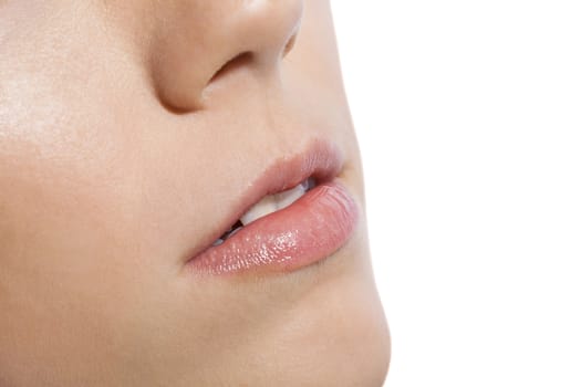 Close up Pink Lips of a Woman on White Background Emphasizing Copy Space.