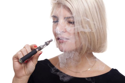 Close up Serious Facial Expression of a Young Blond Woman Smoking Using E- Cigarette on a White Background