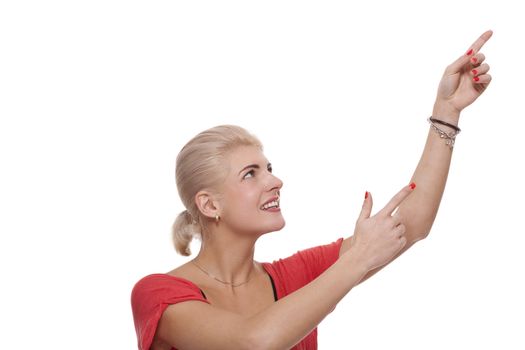 Close up Happy Young Blond Woman Pointing on Upper Right with Both her Hands. Isolated on White Background