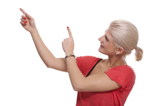 Close up Happy Young Blond Woman Pointing on Upper Right with Both her Hands. Isolated on White Background